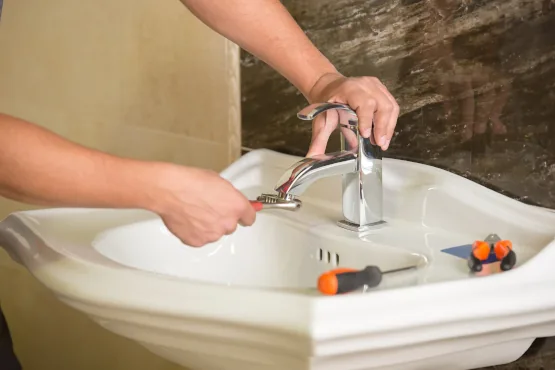 Emergency plumber repairing a bathroom tap in Clerkenwell EC1 Emergency plumber repairing a bathroom tap in Clerkenwell EC1